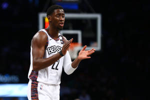 Caris Levert Clapping On Court Wallpaper