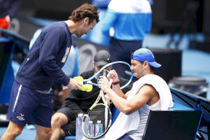 Carlos Moya Assisting Nadal Wallpaper