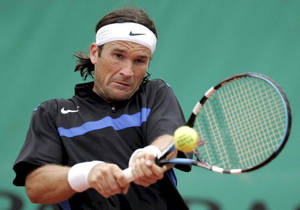 Carlos Moya Hitting Tennis Ball Wallpaper