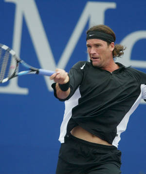 Carlos Moya Playing Tennis Wallpaper