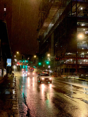 Cars On Streets Under Seattle Rain Wallpaper