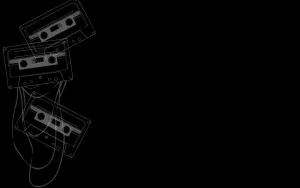 Cassette Tapes On Blank Black Wallpaper