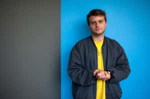 Casual Man Against Blue Background Wallpaper
