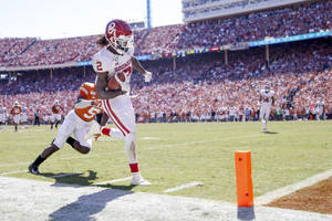 Ceedee Lamb Football Field Wallpaper