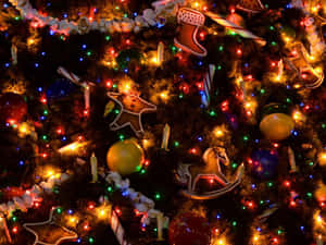 Celebrate The Holidays With Stylish Christmas Ornament Lights Wallpaper