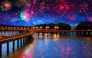 Celebrating New Year's Eve On A Connecting Bridge Wallpaper