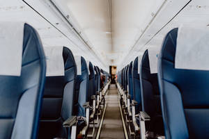 Chairs Inside Airplane 4k Wallpaper