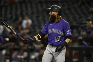 Charlie Blackmon Holds Bat Wallpaper