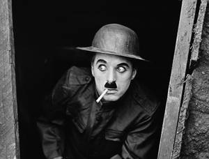 Charlie Chaplin With Cigarette Wallpaper