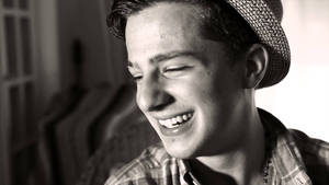 Charlie Puth Widely Smiling Wallpaper