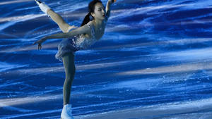 Charming Girl On Ice Skating Rink Wallpaper