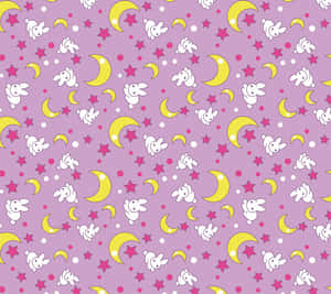 Charming Pastel Sailor Moon Surrounded By Magical Stars Wallpaper