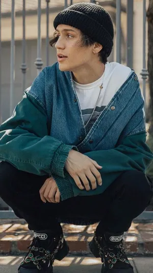 Chase Hudson Gucci Boots And Blue Denim Jacket Wallpaper