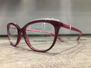 Chic Red Eyeglasses By Tiffany & Co. Wallpaper