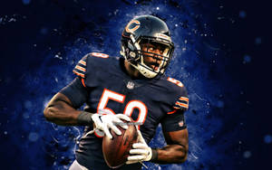 Chicago Bears Roquan Smith Holding A Ball Wallpaper