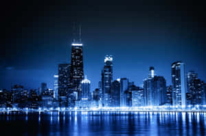 Chicago City Night Skyline With Blue Lights Wallpaper