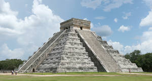 Chichen Itza Against A Cloudy Sky Wallpaper