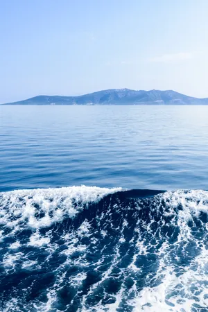 Chill Iphone Sea Waves And Mountain Range Wallpaper