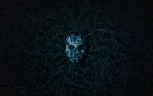 Chilling Image From A Black Horror Film Wallpaper