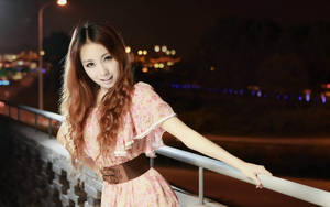 Chinese Woman Posing On Bridge Wallpaper