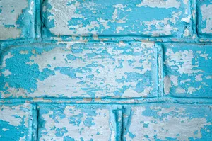 Chipped Blue Brick Wall Wallpaper