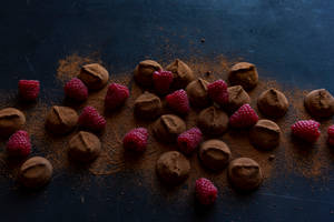 Chocolate Bites And Raspberries Wallpaper