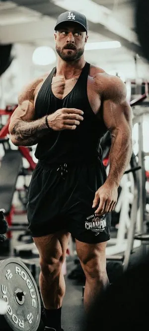 Download free Chris Bumstead With Gymshark Tank Top Wallpaper