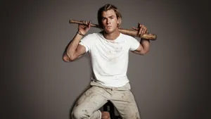 Chris Hemsworth Holding A Bat Wallpaper
