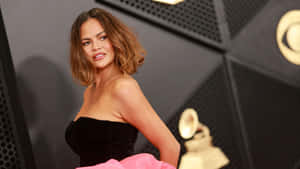 Chrissy Teigen Black Pink Dress Grammys Wallpaper
