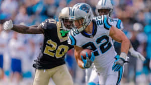 Christian Mccaffrey Of The Carolina Panthers At Soldier Field Wallpaper