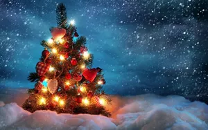 Christmas Aesthetic Computer And Small Tree Wallpaper