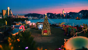 Christmas Lights Illuminating A Village Wallpaper