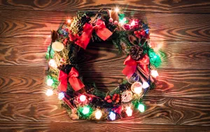 Christmas Wreath With Colorful Lights Wallpaper