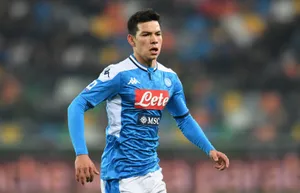 Chucky Lozano In Action On The Soccer Field Wallpaper