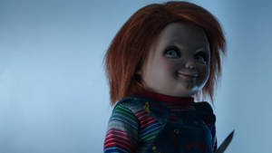 Chucky With Smirking Face Wallpaper