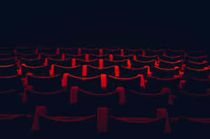 Cinema Seatsin Dark Theater Wallpaper