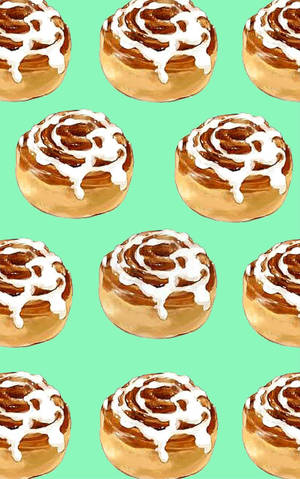 Cinnamon Rolls With Mouth Watering Glaze Toppings Wallpaper