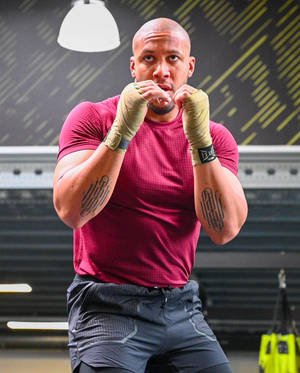 Ciryl Gane Fists Raised Wallpaper