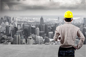 Civil Engineering Expert At Work Site Wallpaper