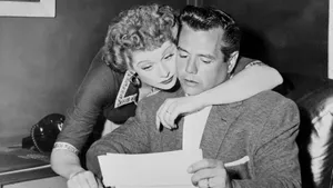Classic Black-and-white Of Lucille Ball And Desi Arnaz In 