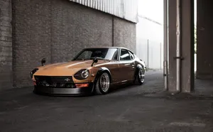 Classic Datsun 1200 In Vibrant Blue Wallpaper