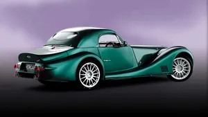 Classic Morgan Sports Car In Motion Wallpaper