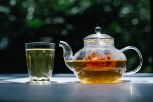 Clear Glass Architecture Against Sky Wallpaper