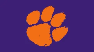 Clemson Tigers Football Orange Paw Print Logo Wallpaper