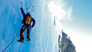 Climbing Man With Ice Axe Wallpaper
