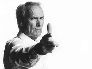 Clint Eastwood Famous Finger-guns Pose Wallpaper