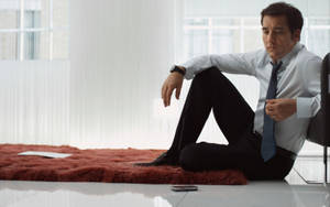 Clive Owen On Floor Wallpaper