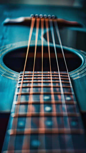 Close Up Acoustic Guitar Strings Wallpaper