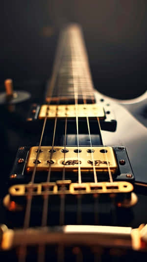 Close Up Electric Guitar Strings Wallpaper