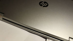 Close-up Hp Laptop With Logo Wallpaper